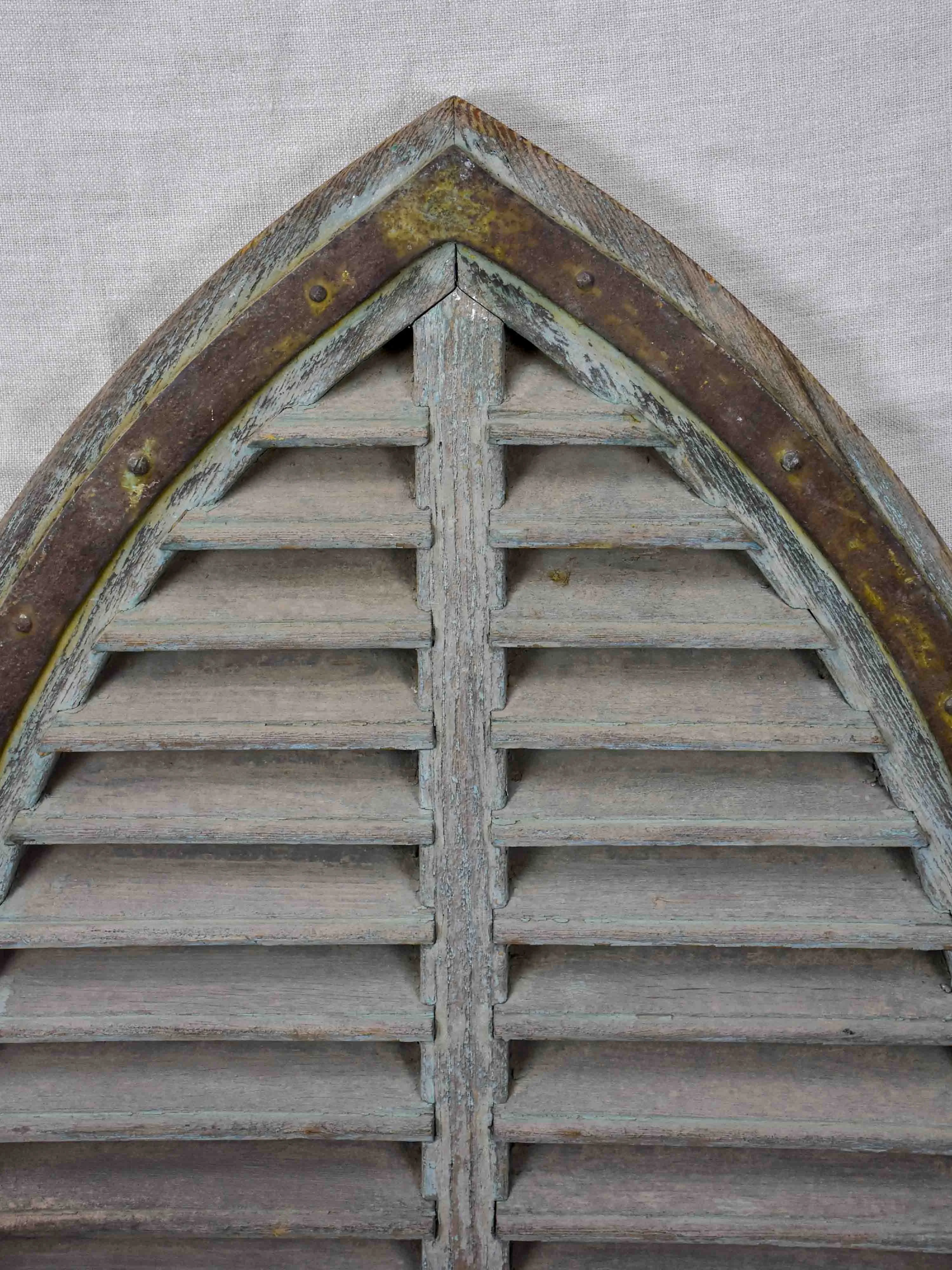 Antique French window with shutters - peaked arch