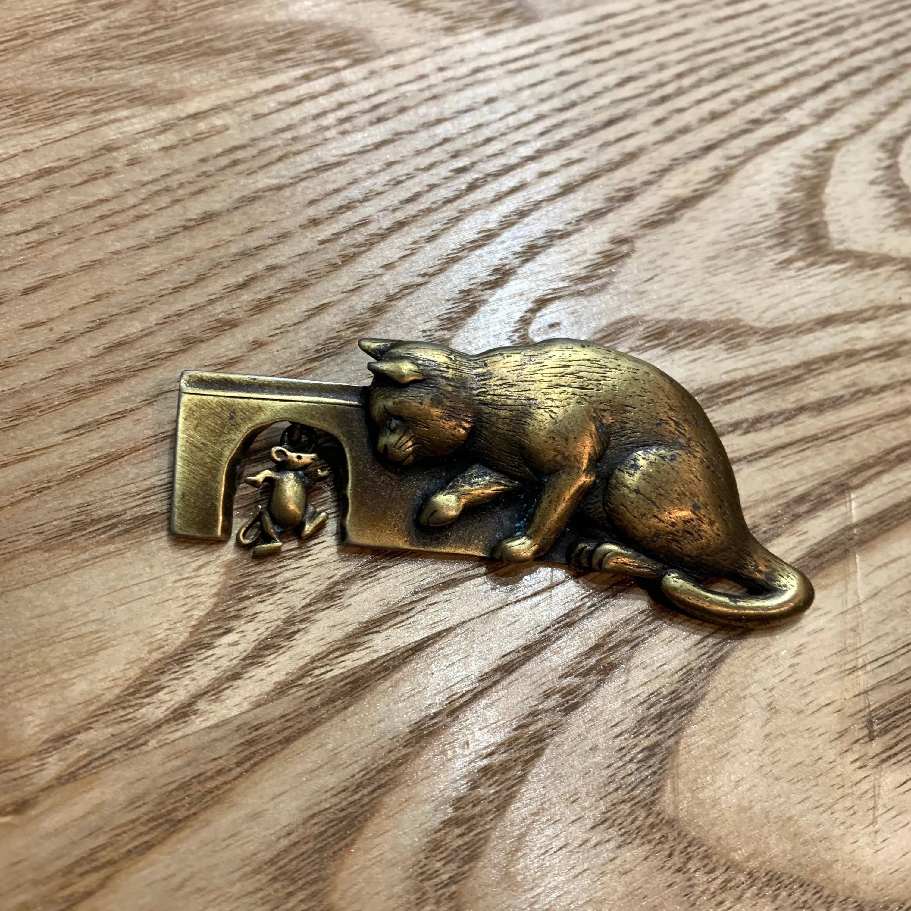 Cat and mouse brooch by JJ in gold colour