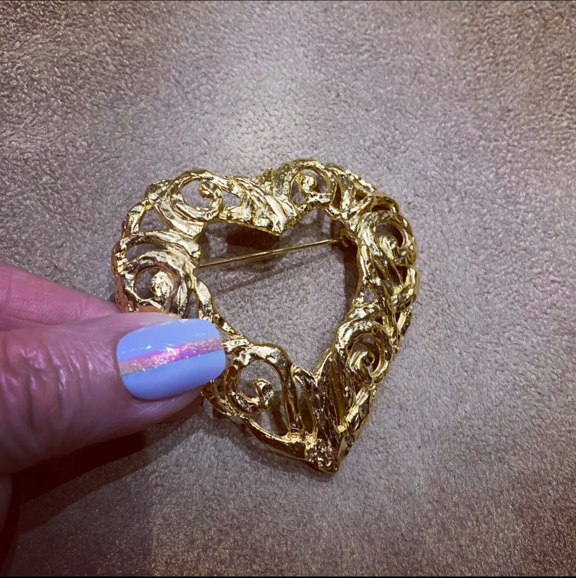 Gold filagree open heart brooch