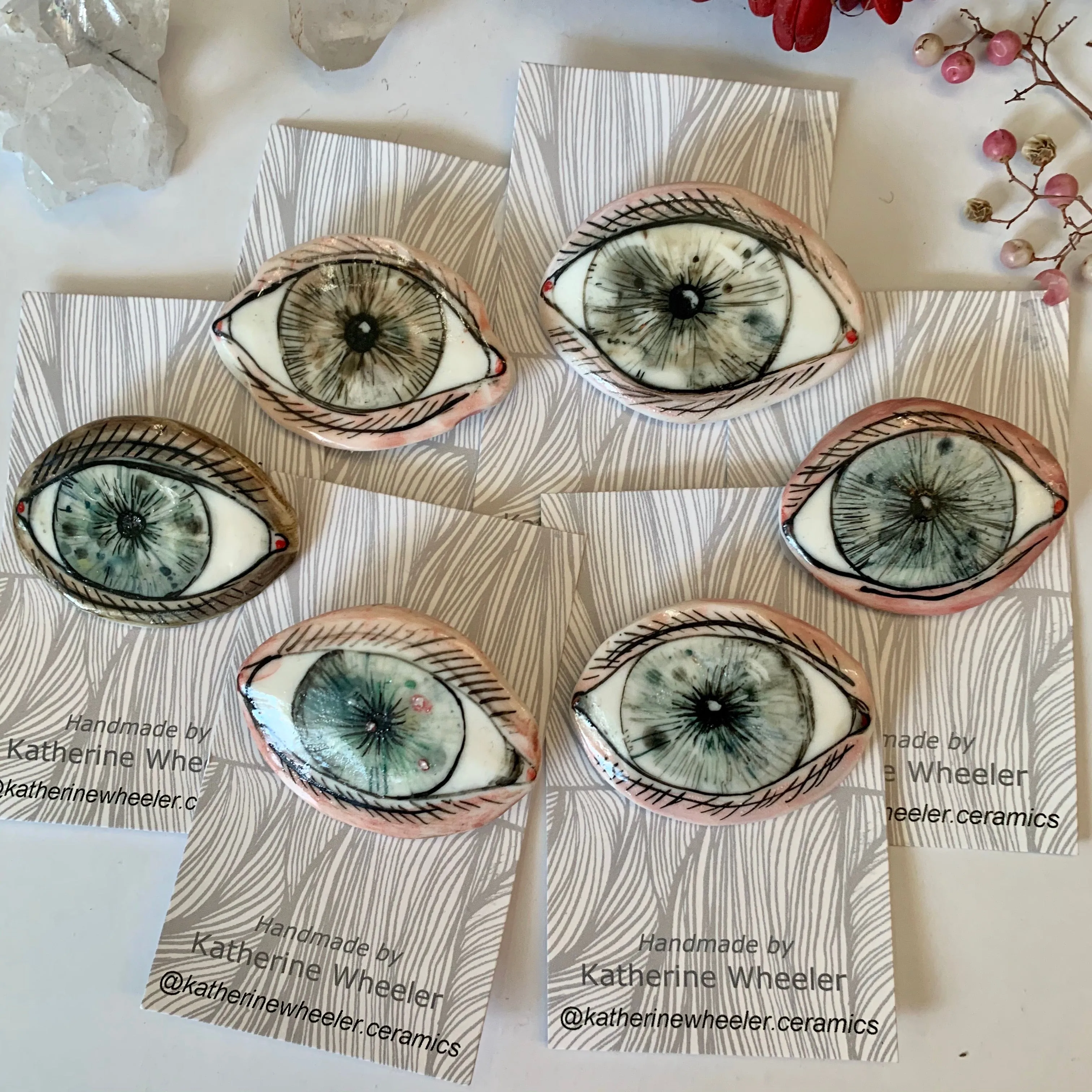 ‘The protective eye’ handpainted porcelain brooch, choose one